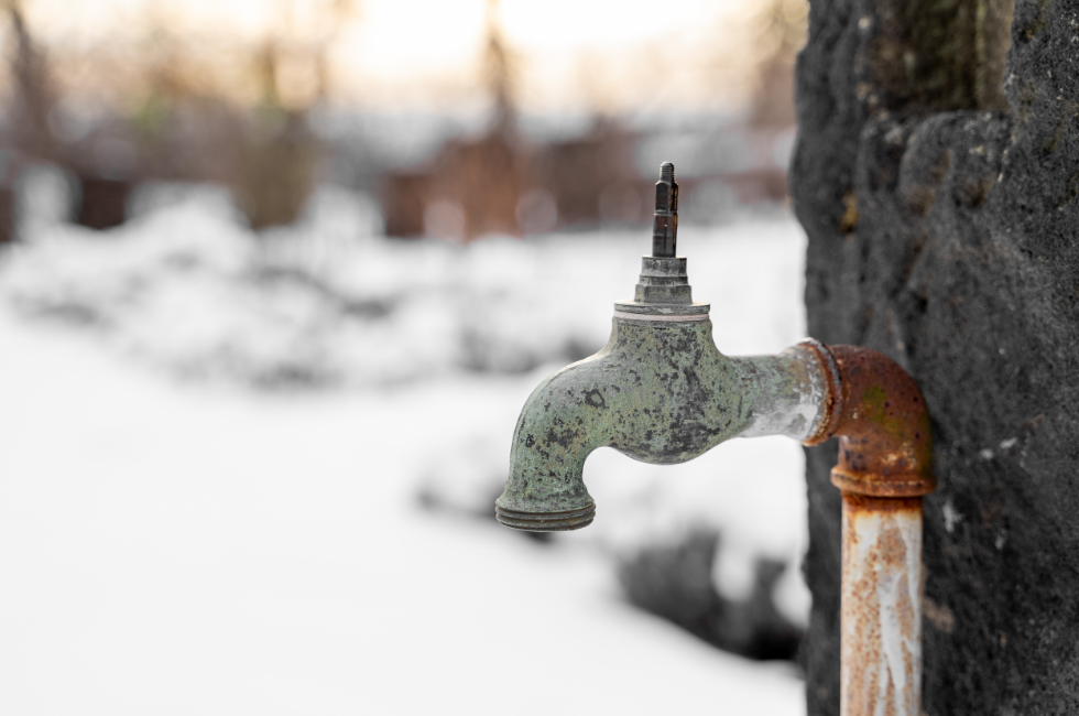 A frozen faucet with a busted pipe.