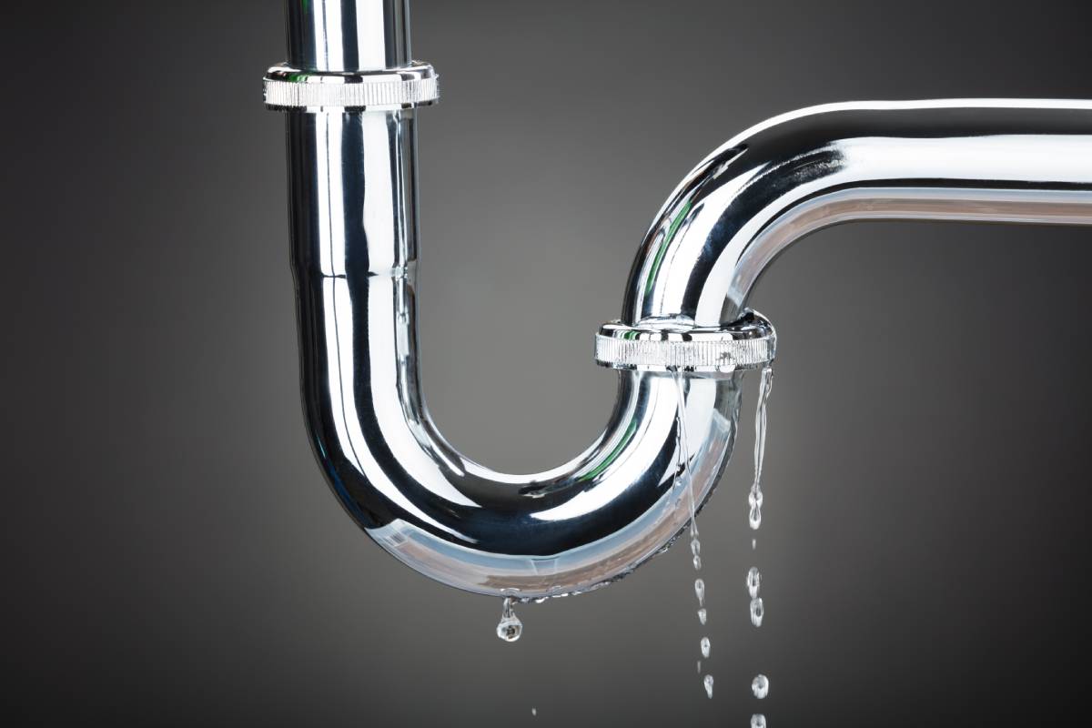 A pipe leaking water.